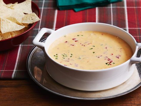 Christmas Queso Recipe | Ree Drummond | Food Network Christmas Queso, Holiday Appetizers Christmas, Ree Drummond Recipes, Christmas Cocktail Party, Queso Recipe, Holiday Party Foods, Pioneer Woman Recipes, Ree Drummond, Holiday Appetizers