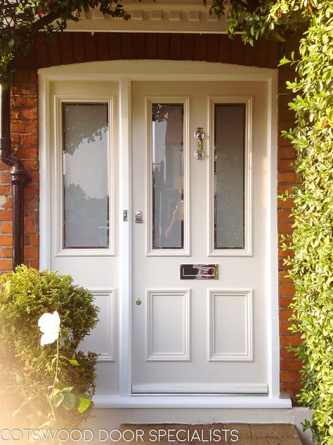 A white, Victorian front door with two etched glass panes and two panels. The glass has been sandblasted with border-less strips. The frame is made with a fixed sash side panel - Cotswood Doors Victorian Front Door, Victorian Doors, Victorian Front Doors, White Front Door, Cottage Front Doors, Front Door Inspiration, Traditional Front Doors, Composite Front Door, Front Door Styles