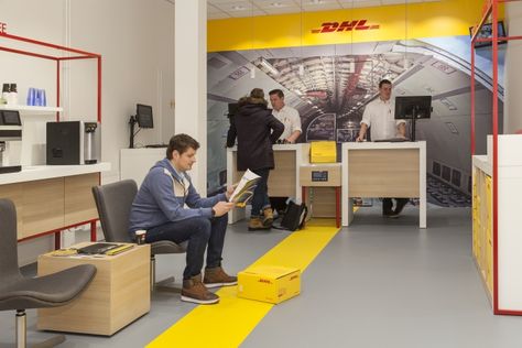 DHL store by Tchai International, Amsterdam – Netherlands » Retail Design Blog Dhl Office Interior, Gold Bars For Sale, Service Counter, Delivery Pictures, Office Pictures, Space Photography, Ocean Freight, Gold Bars, Shop Fittings