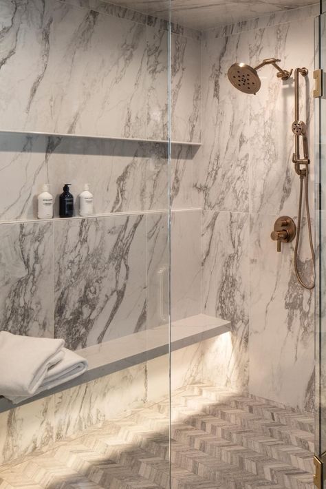 Elevate your daily routine with the epitome of luxury: a marble-encased shower adorned with opulent gold fixtures and an underlit shower bench. ✨ Immerse yourself in sophistication as you step into this lavish oasis, where every detail exudes elegance and refinement. Let the soft glow from the underlit bench envelop you in warmth as you indulge in a moment of pure relaxation. Experience the pinnacle of indulgence in your own home spa retreat. #LuxuryBathroom #MarbleShower #GoldFixtures Luxury Shower With Bench, Marble Shower Gold Fixtures, Bathroom Shower Seat Ideas, Bench In Shower Ideas, Shower Bench Ideas Built Ins, Stone Shower Bench, Built In Shower Bench, Shower Bench Ideas, Luxury Home Spa