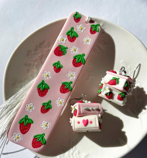 I’ve spent my day making strawberry bookmarks 🍓📚 The classic one has been the most popular item in this drop so far! Which is your favourite? Strawberry Polymer Clay Earrings, Cute Bookmarks Diy, Clay Tray, Ceramica Ideas, Kawaii Clay, Fimo Art, Sculpted Jewelry, Clay Inspo, Easy Photography Ideas