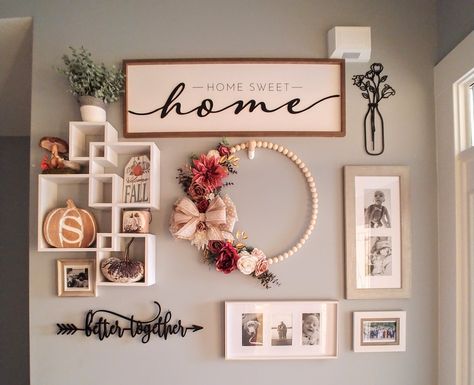 This gallery wall in my entryway is an easy way to highlight my wreaths and use small seasonal decor changes to make a unique and versatile statement! #wreaths #gallerywall Wreath Gallery Wall, Gallery Wall With Wreath, Entryway Gallery Wall, Floral Digital Print, Seasonal Wreaths, Southern Living, Entryway, Seasonal Decor, Sweet Home