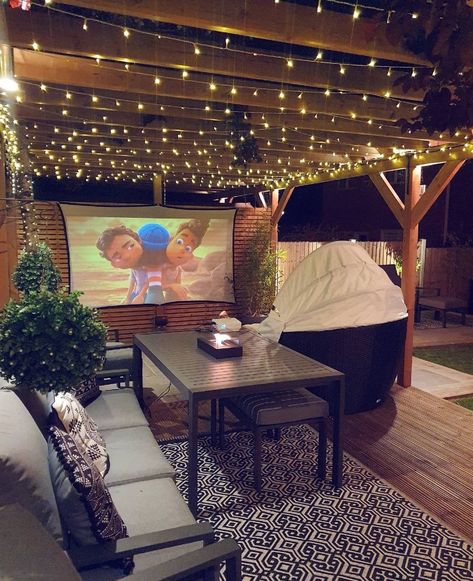 Hangout Backyard Ideas, Small Yard Bbq Area, Matching Living Room And Dining Room, Under Deck Hangout, Small Backyard Deck Ideas On A Budget, Pergola With Projector Screen, Small Backyard Tv Ideas Patio, Small Backyard Hangout Ideas, Tv Patio Ideas Outdoor