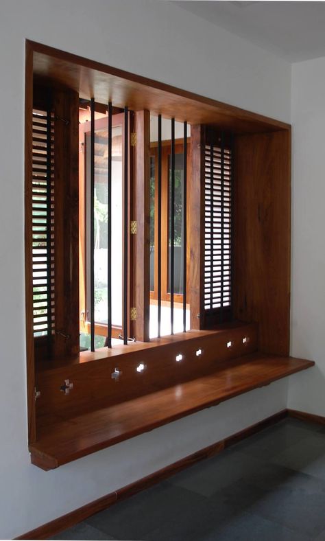 Jeena's Residence | Projects | Bhoomija Creations Wooden Windows Ideas, Window And Door Designs, Traditional Window Design, Kerala Window Designs, Indian Wood Window Design, Window Wood Design, Window With Seating Area, Nadumuttam Ideas, Kerala Home Interiors