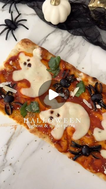 Amy Romfo on Instagram: "Your little goblins are going to love this pizza! It’s seriously so easy to make and you can customize to their picky tastes 🤍.

- 1 flatbread (I get ours at Trader Joe’s).
- 1/2 cup pizza sauce
- 10 black olives pits removed 
- 3-4 mozzarella cheese slices 
- fresh basil
- balsamic glaze 

Preheat your oven to 400°F (200°C).

Prepare the flatbread and brush the surface of the flatbread with olive oil. 

Spread pizza sauce. If desired, sprinkle garlic powder and Italian seasoning for extra flavor.

Using a cookie cutter, cut out ghost shapes in the cheese slices. Place on pizza.

Slice olives and create spiders.

Sprinkle shredded mozzarella or Parmesan over the flatbread, focusing on the ghost shapes. Make sure to leave some areas without cheese to define the gho Wreath Pizza, Pizza Halloween, Black Olives, Balsamic Glaze, Pizza Slice, Trader Joe’s, Trader Joe, Shredded Mozzarella, Black Olive