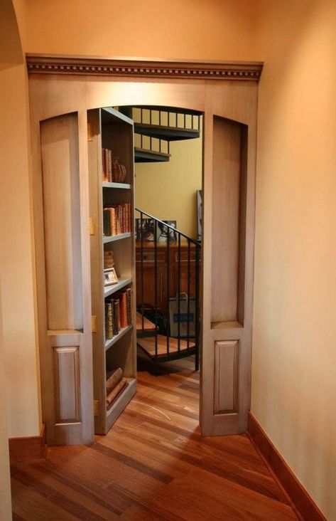 Concealed spiral staircase to a hidden second level: | 31 Beautiful Hidden Rooms And Secret Passages Gömda Rum, Hidden Rooms In Houses, Secret Rooms In Houses, Home Engineering, Hidden Doors, Panic Rooms, Secret Passages, Secret Passageways, Bookcase Door