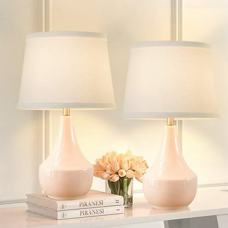 NATYSWAN Ceramic Table Lamp Set of 2 for Home Decor. This table lamp set adds atmosphere and color to the home decoration. It goes well with any room style such as minimalist, modern, vintage style, and so on. The modern bedside lamps are adopted with the high-quality white fine fabric lampshade and stable LED bulb which not only makes the glow softer to create a warmer and cozy atmosphere for you at night but also effectively relieves eye fatigue and protects the eyesight of your family. whethe Lamps Nightstand, Table Rose, Pink Lamp, Pink Table Lamp, Lamp For Living Room, Nightstand Lamp, White Lamp Shade, Lamp Set, Pink Table