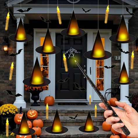 Get ready to cast a spell this Halloween with the 12-piece Magic Hanging Candles set. These floating light-up witch hats come with a flameless candle and a wand remote for easy enchantment. Plus, the set includes witch hat 3D bats wall stickers to add that extra touch of spookiness to your Halloween party decorations. Perfect for creating a bewitching atmosphere! Halloween Candle Decor, Decorations For Halloween, Bat Wall, Witch Hats, Floating Lights, Hanging Candles, Halloween Candles, Flameless Candles, Floating Candles