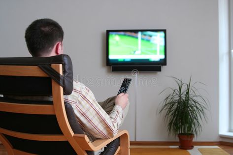 Watching Tv Pose Reference, Someone Watching Tv, Watching Tv Reference, Person Watching Tv, Watching Tv Drawing, People Watching Tv, Man Watching Tv, Man Sitting On Chair, Television Photography