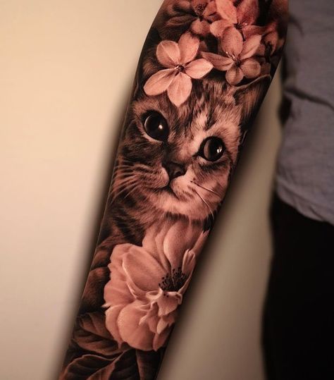 Kitty tattoo by @jc.vittorelli.ink #cattattoo #cattattoos #kittytattoos Cat Cover Up Tattoos For Women, Cat Sleeve Tattoos For Women, Cat Tattoo Sleeve Women, Animal Tatoos Woman, Cats And Flowers Tattoo, Arm Cat Tattoo, Animal Portrait Tattoos, Animal Sleeve Tattoo For Women, Cat Tattoo Arm