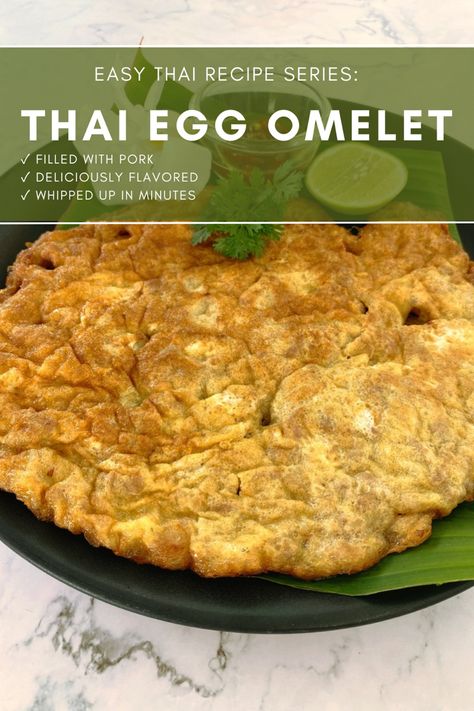 Thai egg omelet with pork on a black plate, a piece of lime, and nam prik pla a spicy dipping sauce. Thai Egg Omelet, Asian Egg Omelette, Thai Fried Egg, Thai Egg Recipes, Thai Omelette Recipe, Thai Eggs, Thai Food Recipes Authentic, Thai Minced Pork, Yacht Food