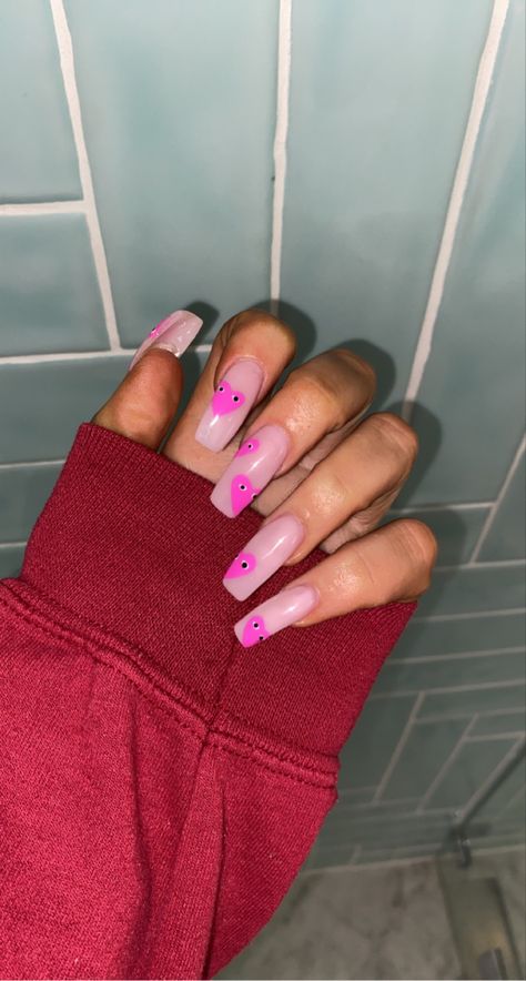 #acrylics #nails #fakenails #naildesigns #heartnails #pinknails #nailart #longnails Best Friend Heart Nails, Heart Eyes Nails, Heart Flame Nails Acrylic, Flaming Heart Nails, Pink Heart Flame Nails, Pink Heart Press On Nails, Heart With Eyes, Heart Eyes, Heart Nails