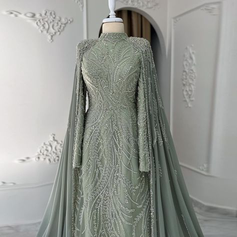 SS387 Luxury Beaded Sage Green Muslim Evening Dress with Cape Long Sleeves Arabic Dubai Women Wedding Party Gowns https://sharonsaiddress.com/products/sharon-said-luxury-beaded-sage-green-muslim-evening-dress-with-cape-long-sleeves-arabic-dubai-women-wedding-party-gowsn-ss387 #dress #dubaidress #mermaiddress #muslimdress #eveningdress #weddinggown Evening Dress With Cape, Wedding Dress Overskirt, Custom Flower Girl Dress, Yellow Evening Dresses, Silver Evening Dress, Purple Evening Dress, Champagne Evening Dress, Muslim Evening Dresses, Dress With Cape