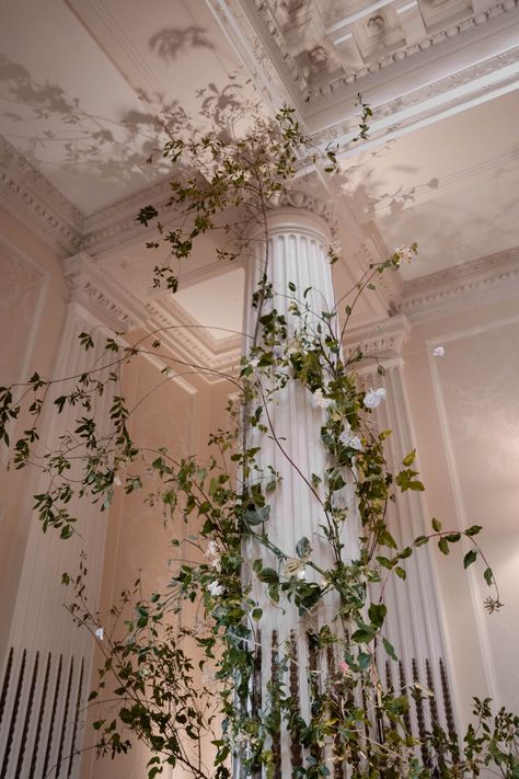 Smilax Vine Wedding, Wedding Floral Hanging Installation, White Floral Pillars Wedding, Floral Tunnel Entrance Wedding, Overhead Floral Installation Wedding, Wedding Venues London, Wedding Foliage, Floral Tree Installation Wedding, White And Green Hanging Floral Installation