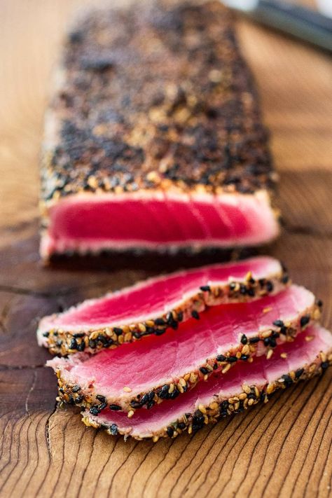 Learn the secret to making perfectly Seared Tuna with a Sesame Seed Crust in just 10 minutes flat. A healthy, delicious ahi tuna recipe that is flavorful and easy to make. Video. Tuna Steak In Oven, Aji Tuna Recipe, Tuna Ahi Recipes, Pan Seared Ahi Tuna Steak, Ahi Tuna Recipe Seared, Ahi Tuna Steak Recipe Seared, Cured Tuna, Tuna Sashimi Recipe, Bluefin Tuna Recipe