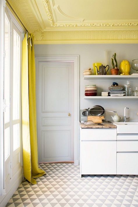 20 Breathtakingly Georgeous Ceiling Paint Colors and One That Isn't -- BM Cool Breeze CSP 665 for ceiling and white walls Ceiling Paint Colors, Yellow Ceiling, Yellow Curtains, Colored Ceiling, Kitchen Ceiling, Parisian Apartment, Yellow Kitchen, Paris Apartments, Wall Molding