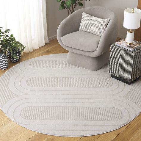 Accentuate your space with this Modern Ivory Round Area Rug. Measuring at a comfortable 6'-7" X 6'-7", this rug becomes the perfect accent piece for your room. Its round shape and subtle ivory tone bring an element of sophistication to any space. Crafted of 35% Polypropylene, 35% Polyester, and 30% Cotton, this rug's composition ensures enduring quality and smooth feel. Constructed using a Power Loomed technique, it is guaranteed to be made with precision and attention to detail. Not only stylish, this round rug is also OEKO-TEX certified, assuring it's free from harmful substances, thus, making it safer for your family and your home. Exclusively made in Turkey, this rug carries the mark of quality craftsmanship. Complement your home decor with this exquisite piece and add elegance to your Round Rug Under Kitchen Table, Green Round Rug, Rug Under Kitchen Table, Penthouse Decor, Circular Rug, Synthetic Rugs, Round Area Rug, Round Area Rugs, Round Rug