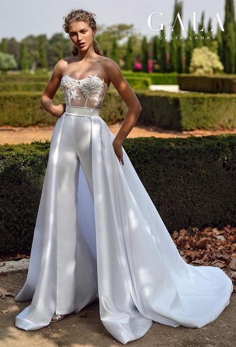 Weddinginspirasi.com featuring - galia lahav gala fall 2019 bridal strapless semi sweetheart neckline heavily embellished bodice bustier modern chic pants a line wedding dress overskirt chapel train (211) mv -- These 13 Looks Prove That Fairytale Wedding Dresses Can Also Be Glamorous #wedding #weddings #bridal #weddingdress #weddingdresses #bride #fashion ~ Reception Jumpsuit, Gowns Corset, Wedding Dress Overskirt, Wedding Pantsuit, Fairy Tale Wedding Dress, Bridal Jumpsuit, Galia Lahav, Wedding Jumpsuit, White Wedding Dress