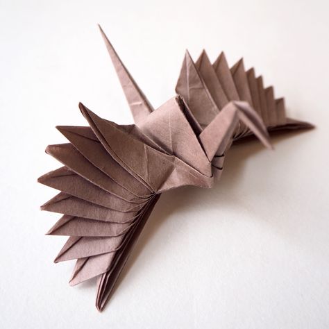 Feathered Tsuru designed by Riccardo Foschi made using Torinoko paper from Japan House London Origami Japan, Origami Dollar, Japan House, Creative Origami, Rubix Cube, Origami Fashion, Paper Cranes, Origami Patterns, Paper Things