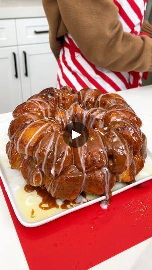 Easy & yummy christmas dessert | Easy & yummy christmas dessert

I make a rolo pull apart bread for christmas dessert. | By Rick's Friend Justine | Alright, these are just my
Rolos. Now, we're going to go ahead
and split our biscuits right in half. Just like that. These are just my original
grand's biscuits. We're going to go ahead and grab half
our biscuit with our Rolo and we are going to cover up that
Rolo and make a little ball just like that. Make sure the
Rolo isn't picking out anywhere. Grab our greased bump
pan and place that right inside. So, we're going to go
ahead and roll up our Rolos in our biscuit dough and fill up
our bump pan. We're going to use about two cans of biscuits
so that we can really fill up our bump pan and get a
delicious and easy dessert. Alright, last one of o