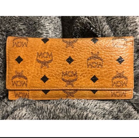 【About this product】 【MCM Long Wallet olding wallet Leather Brown / 00524】 ■Condition:  Good. This item is used. There are some minor scratches,  but no problems in use. Please check the pictures. ＊Main body only ★If you have any items you're looking for, please contact me. 【Shipping】 Shipment by Standard US. Shipping to Europe, UK, Asia & Mexico by Registered airmail (as standard international shipping). 5-10 days from purchase to shipping. Estimated arrival time is 5-10 days for USA Europe, UK, Asia & Mexico will arrive in 7-15 days. (There seems to be a delay in delivery at the moment, so we don't know if it will arrive in this time frame） Economy shipping is also available Shipping fee will be $10.00. Economy shipping takes about 2 months to arrive There are many countries that are una