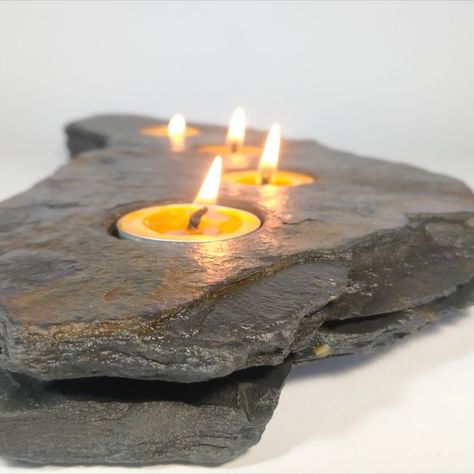 The presented candle holder is a handicraft made out of a natural stone.
This is a bit of a wild nature, so it`is havy and massive, but beautiful.

For tealights.

This handicraft is protected with special stone impregnations against stains and give shine and deepen the structure and color.

The combination of stone and fire, after dark, makes an impression and is truly exceptional... Stone Lamps, Long Candle Holder, Rock Of Love, Rock Candle Holder, Diy Candle Wick, Have A Nice Evening, Stone Candle Holder, Rock Candle, Stone Lamp