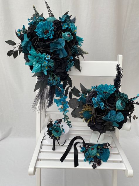 Custom Realistic Artificial Gothic Teal and Black Cascading wedding bouquet. This stunning bouquet has been custom made with quality silk & real touch flowers. The bouquet handle has been wrapped with satin ribbon and come with colour coordinated satin bows.  This bouquet is approximately 22 x 12 inches (54 x 30cm) The matching buttonhole has also been made with silk & real touch flowers & all buttonholes come with integral pin attached. These bouquets are also available in another listing in our shop Bridal bouquet - 10 inches diameter Corsages Black Turquoise Wedding, Sapphire And Black Wedding Theme, Teal And Black Wedding Flowers, Black And Dark Teal Wedding, Black And Teal Wedding Dress, Teal And Black Wedding Theme, Deep Teal Wedding Colors, Emerald And Dusty Blue Wedding, Teal And Black Wedding Ideas