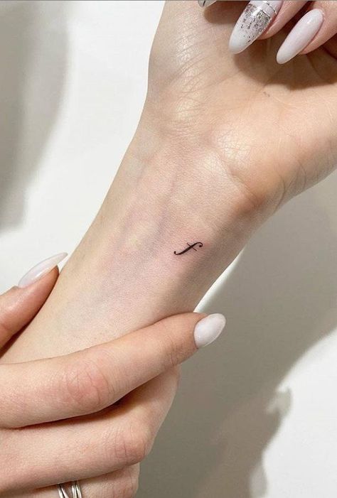 A women's lifestyle destination dedicated to style, entertainment, love, and living beautifully. F Letter Tattoo Ideas, Small F Tattoo, Cursive F Tattoo, F Initial Tattoo, F Tattoo Letter Initial, F Tattoo Letter, Small Hand Tattoos For Women Unique, Letter F Tattoo, E Tattoo Letter