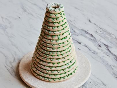 Kransekake Recipe | Food Network Kitchen | Food Network Kransekake Recipe, Desserts Party Ideas, Desserts Party, Celebration Desserts, Powdered Food Coloring, Holiday Baking Recipes, Dessert Spread, Meringue Powder, Holiday Dessert Recipes