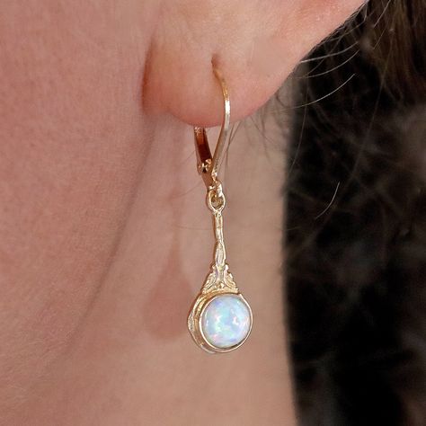 "Solid gold 14K Victorian earrings, Opal gold earrings, Dainty earrings, white Opal earrings. This earring is simple but the Magic Blue color will strike from a distance. Also available with Garnets, Chalcedony, Pearls, Moonstone and Aquamarine. Opal- Is the birthstone for the month of October, it represents Hope, faith, and good luck. 🌸 Product details: Handmade earrings 🌸 Measurements: Weight - 2 g Length - 1.2\" (3 cm) Width -  0.3\" (0.75 cm) Opals diameter - 0.23\"  (6 mm) 🌸Materials: 14 Boho Rings Gold, Faberge Jewelry, Blue Opal Earrings, White Opal Earrings, Opal Drop Earrings, Victorian Earrings, Earrings Opal, Gold Earrings For Women, Opal Pendant Necklace