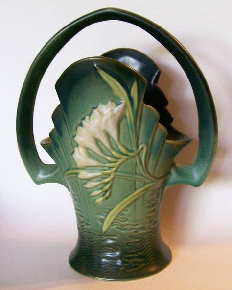 Like ours...if it took steroids! This is our color.  Roseville Freesia Basket c. 1945 Roseville Pottery Vintage, Ceramic Totem, Green Vases, Craft Ideas Paper, Pottery Display, Hanging Craft Ideas, Antique Vases, Collectible Pottery, Pottery Vases