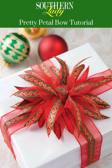 Add some sparkle and splendor to your holiday gifts with a pretty poinsettia-inspired bow. See our step-by-step tutorial here! Diy Wreath Bow, Christmas Bows Diy, Homemade Bows, Bows Diy Ribbon, Southern Lady, Gifts Wrapping Diy, Creative Diy Gifts, Gift Wrapping Bows, Bow Tutorial