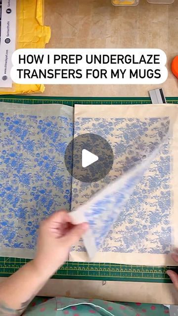 Emma Puddick Pottery on Instagram: "In my last reel, I showed you how I apply underglaze transfers to my mugs - here’s what I do before that!

The transfers come in sheets - these have 48x33cm of usable pattern on them - which I cut to size for my pots.  They are an expensive material (one sheet will set you back close to a tenner from a UK retailer) so I use them as efficiently as I can. For my mugs, I use a strip to go around the body and a smaller strip to cover the handle. I have worked out a pattern to get 7 mug strips and 7 handle strips from 2 sheets of transfer and I stick to it religiously. 

I’ve done so many of these! Originally I would cut them one sheet at a time with scissors! Then I upgraded to a rotary cutter and the real game changer was getting a 50cm ruler 📏😆

#pottery Pottery Transfer Ideas, Underglaze Transfer Ideas, Underglaze Transfer Pottery, Pottery Transfers, Underglaze Transfer, Wheel Thrown Ceramics, Wheel Thrown Pottery, Pottery Handmade, Go Around