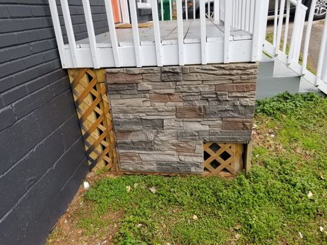 Lisa used our Kenai Stacked Stone panels in a remodel project. She cleared away hedges, repainted the exterior, created an accent wall, and put it over the lattice under her porch. Visit our Inspiration Gallery for before and after photos of this project! #GenStone #DIY #MyGenStoneDIY #FauxStonePanels Faux Stone Exterior Before And After, Exterior Wainscoting, Brick Wall Exterior Ideas, Faux Siding Exterior, Faux Stone Siding Exterior Ideas, Stone Accent Wall On House Exterior, Stacked Stone Front Porch, Faux Stone Skirting, Fake Stone Exterior