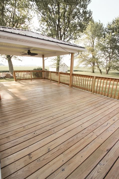 Interior decorator and home blogger Liz Fourez shares everything you need to know about staining a deck from prep to finish! Patio Deck Stain Ideas, Back Porch Stain Colors, Refinish Deck Wood, Light Stained Deck, Deck Stain Colors For Gray House, Light Deck Stain Colors, Natural Deck Stain Ideas, Porch Wood Stain, Light Deck Stain