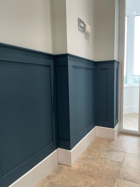 Colourful Wainscoting, Blue Waynes Coating Ideas, Wainscoting Two Tone, Dark Teal Board And Batten, Navy Wainscoting Hallway, Navy Panelling Hallway, Living Room Half Wall Paneling, Coloured Wainscotting, Blue And White Wall Panelling