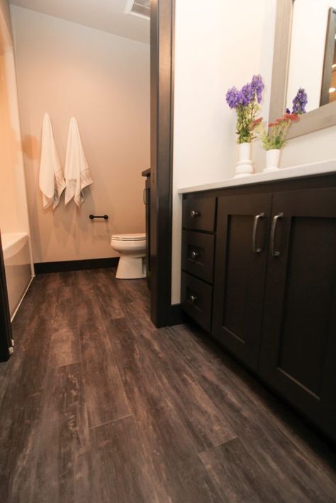 Dark Luxury Vinyl Plank Bathroom Floor Dark Wood Bathroom Floor, Dark Vinyl Flooring, Luxury Vinyl Plank Bathroom, Dark Vinyl Plank Flooring, Vinyl Plank Flooring Bathroom, Vinyl Plank Flooring Kitchen, Flooring Bathroom, Dark Luxury, Dark Wood Bathroom