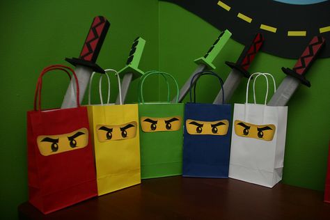 Lego Ninjago birthday party favor bags Birthday Ninjago, Martial Arts Party, Ninja Theme Party, Ninja Party Favor, Karate Party, Lego Ninjago Party, Ninja Birthday Party, Ninjago Birthday Party, Ninja Birthday Parties