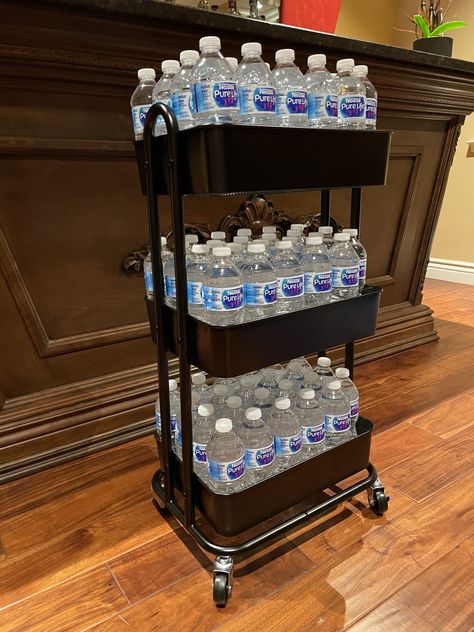 14 Efficient Bottled Water Storage Ideas for Small Spaces - Addicted To Organization Drink Storage Ideas Garage, Extra Drink Storage Ideas, Diy Drink Storage Ideas, Bottle Water Storage Ideas, Water Bottle Organization Ideas, Bottled Water Storage Ideas, Bottled Water Storage, Drink Storage Ideas, Water Storage Ideas