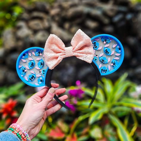 Get ready for a Hawaiian rollercoaster ride of Stitch expressions! 😄😠😜 Our 626 interchangeable ears capture so many of Stitch's moods, from mischievous grins to heart-melting smiles. And my favorite tiny detail, Scrump peeping out. Don't miss your chance to wear all the sides of Stitch's personality, launching this Friday! ● Disney merch, Lilo and Stitch, Small Shop, Disney Trip Stitch Mickey Ears, 626 Stitch, Disney Trip Outfits, Shop Disney, Disney Mickey Ears, Disney Merch, Fab Five, Iridescent Sequin, Loungefly Bag