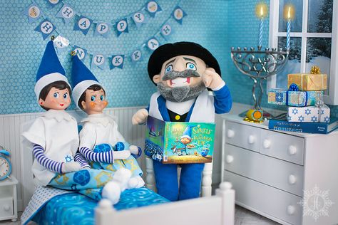 ꧁ 𝕯𝖊𝖈𝖊𝖒𝖇𝖊𝖗 ❷❷ ꧂ It’s the first day of Hanukkah, Our Mensch takes the glory. For the elves are excited, He’s here with a story. It’s a diverse holiday tale, About a curious little elf, That learns about Hanukkah, Whom Santa named Shmelf. Shmelf is a Jewish elf, Who wears blue and white. Enjoys latkes, the dreidel, And the menorah’s bright lights. Elf On The Shelf Hannukah Ideas, Elf On The Shelf Hanukkah Ideas, Hanukkah Elf On The Shelf, Elf On The Shelf Hannukah, Hannakah Theme Crafts, What Is Hanukkah For Kids, Story Of Hanukkah, Hanukkah Word Search, Elf Pajamas