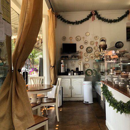 Owning A Bakery Aesthetic, Cottagecore Bakery Interior, Cottagecore Cafe Aesthetic, Cottagecore Coffee Shop Aesthetic, Small Bookstore Cafe Aesthetic, Cottage Core Bakery Interior, Cottage Core Bakery, Cottagecore Bakery, Cottagecore Cafe Exterior