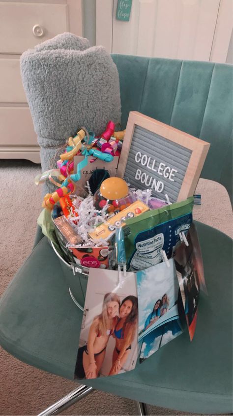 my friend and I put together this adorable gift basket for our friend who is going away for college for her grad party. so simple, cute and easy! just got some essentials, fav candy and dorm decor! Grad Gift Ideas For Friends, Friend Graduation Gift Ideas, Grad Gift For Best Friend, Grad Gift Basket Ideas, Gift Basket Ideas Senior Night, College Gifts Basket, Moving Out Gift Basket, Roommate Gift Basket, Grad Gift Ideas For Best Friend