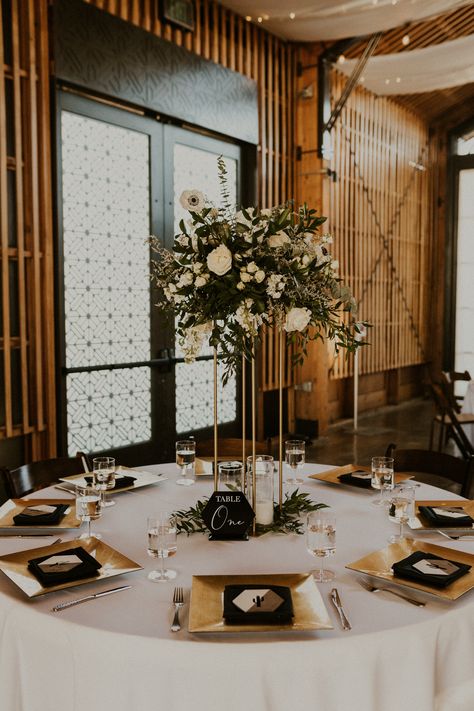 Gold is the perfect accent to bring warmth to any black & white modern wedding. Plus, these gold square chargers are absolutely amazing! #yourjubilee #yjwedding #arizonaweddingplanner #arizonawedding || CREDITS: @yourjubilee @arraydesignaz @thepaseovenue @laceandabarn @kayfishphoto Gold Satin Tablecloth Wedding, Black And White With Gold Accents, Black Wedding Gold Accents, Black Wedding With Gold Accents, Black White And Gold Winter Wedding, Wedding Table Decorations Black And Gold, Black White Gold Gala Decor, Gold White Black Wedding Theme, Black Gold Wedding Theme Decoration