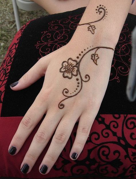 Explore the world of henna tattoos with our collection of 55+ of the best designs. As a bonus, we'll give you the meaning and care tips for these patterns Henna For Inside Hand, Hena Cute Design, Hena Simple Design, Henna Designs Kids Simple, Henna Cool Designs, Henna For Little Kids, Contoh Henna Simple, Corak Inai Simple Cantik, Hena Tato Desain Easy