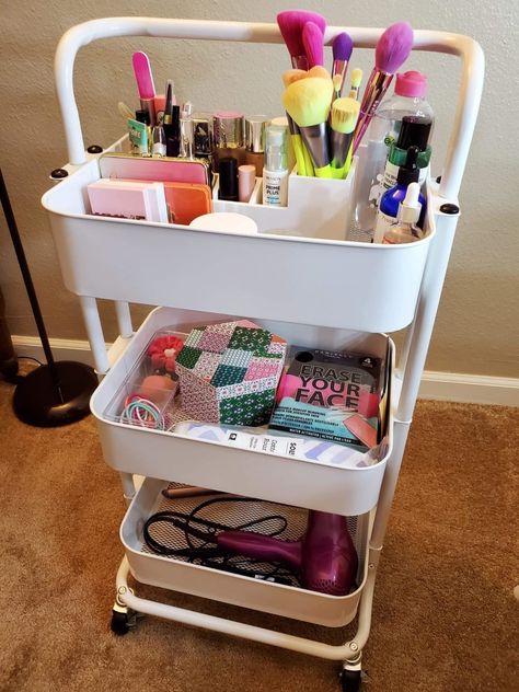 A three-tier storage cart that can hold anything that needs sorting, from beauty products to craft supplies. Make Up Storage Cart, Beauty Storage Bedroom, Trolley Cart Organization, Rolling Cart Makeup Organizer, Storage Beauty Products, Vanity Cart Organization, Small Room Makeup Storage, Beauty Supplies Organization, Organization Beauty Products