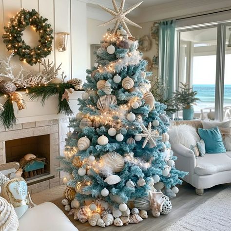 Transform your beach house into a holiday haven with a tree decorated in starfish, shells, and coastal elements. Beach Themed Christmas Trees, Turquoise Christmas Tree Decorations, Beach Christmas Decor Ideas, Beach Christmas Tree Ideas, Christmas By The Sea, Beach Theme Christmas Tree Ideas, Beach House Christmas Decor, Coastal Christmas Tree Ideas, Nautical Christmas Tree