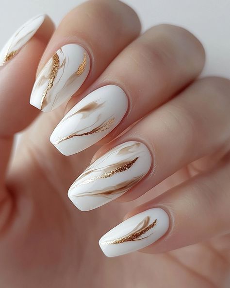 ✨ Indulge in the creamy elegance of our latest nail polish collection, where artistry meets sophistication. Each design celebrates the subtle charm of soft hues, effortlessly elevating your style to new heights. 🖌️💅 Unleash your inner artist and adorn your nails with these refined creations! #NailArt #EleganceInEveryStroke Creamy Nails, Gold Nail, Cream Nails, Effortless Beauty, Nail Polish Collection, Gold Nails, You Nailed It, Nail Designs, Nail Polish