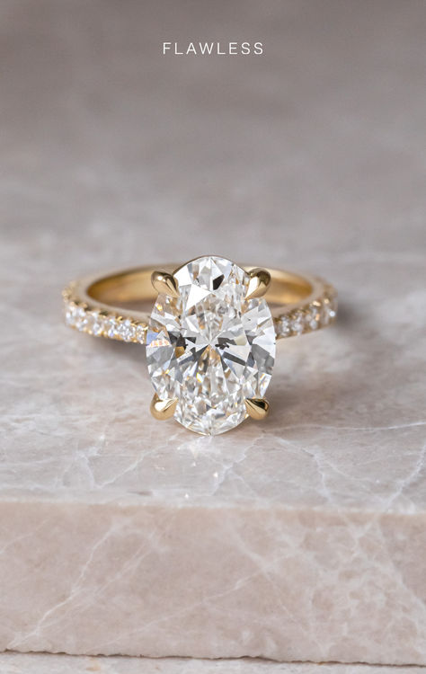 The four claw is a simple but elegant setting, add to that the timeless beauty of a diamond set band and you have this captivating ring that gives us all the feels 🥰🫶  Is this your forever ring? 💍🤍  Florian Setting 2.90ct Center Stone Oval Cut Diamond Band 18k Recycled Gold  #engagementring #diamondring #diamondband #ovalcut #yellowgold #engagementideas #elegantrings #ovaldiamond #engaged Olivia Culpo Ring, Gold Oval Wedding Ring Set, Oval Engagement Ring Pave Band, Engagement Ring Pave Band, Pave Oval Engagement Ring, Yellow Gold Pave Engagement Ring, Gold Pave Engagement Ring, Claw Engagement Ring, Gold Oval Engagement Ring