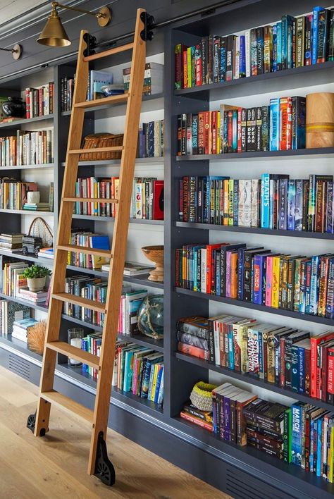 These cozy spaces are a book-lover's dream. How To Build A Home Library, Small Library In House, Wall Library Ideas, Small House Library Ideas, Home Library Ladder, Farmhouse Library Room, Rolling Ladder Bookshelf, Study Library Room Ideas, Library Wall With Ladder